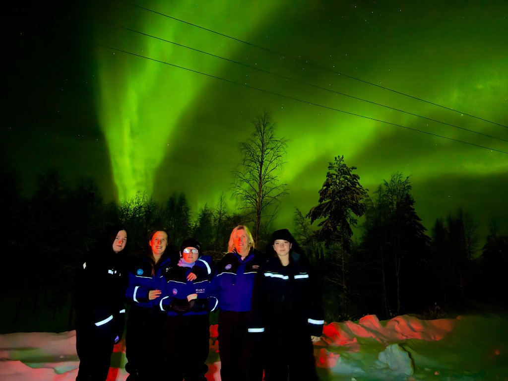 Glass igloo night under the northern lights in Lapland